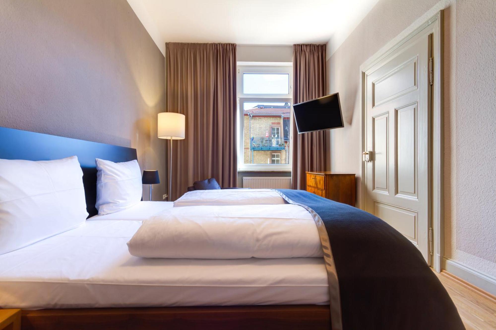 Qube Hotel Bergheim Хайдельберг Экстерьер фото